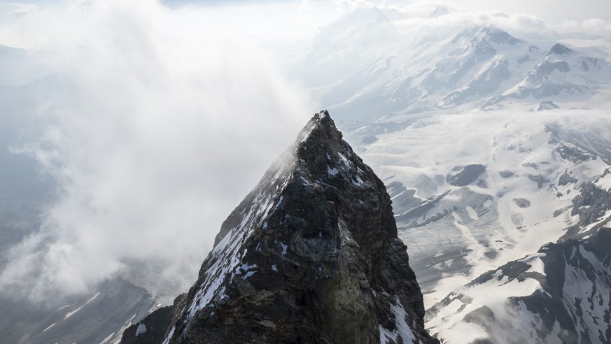 The summit of Matterhorn mountain, in Zermatt, Switzerland, Friday, July 17, 2015. This same day, delegations of the four nations, Switzerland, Italy, France and Great Britain climb the Matterhorn mou ...