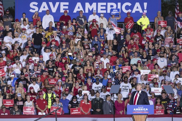 epa09321856 Former US President Donald J. Trump (R) speaks during a rally at the Sarasota County Fairgrounds in Sarasota, Florida, USA, 03 July 2021. Former US President Donald J. Trump has taken to t ...