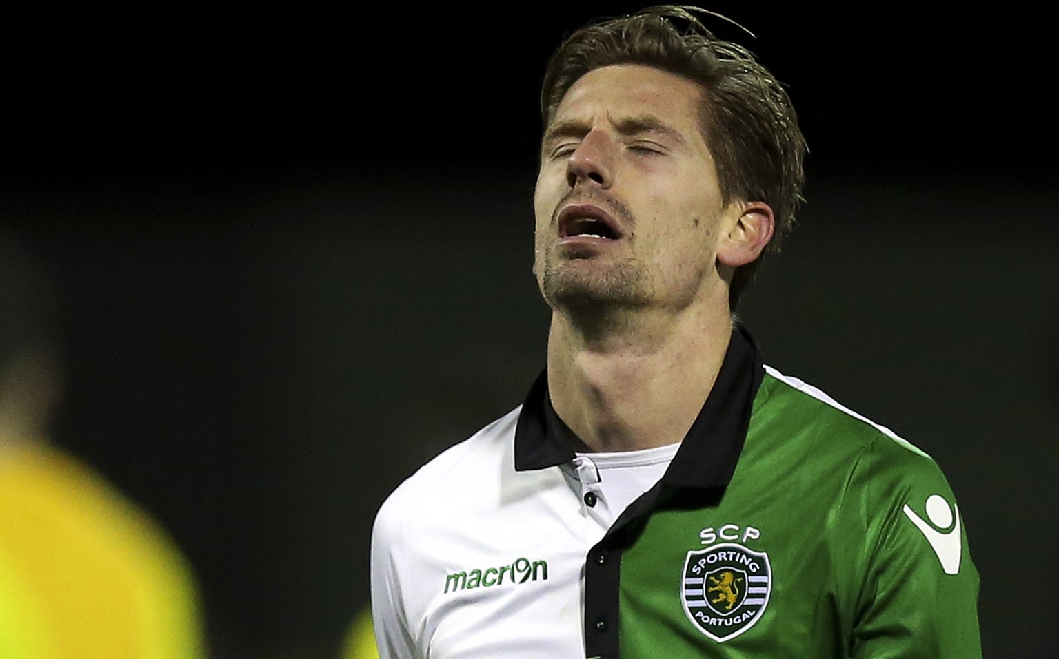 epa05725741 Sporting Adrien Silva reacts after losing their Portuguese Cup soccer match held at Chaves Municipal stadium, Chaves, Portugal, 17 January 2017. EPA/JOSE COELHO