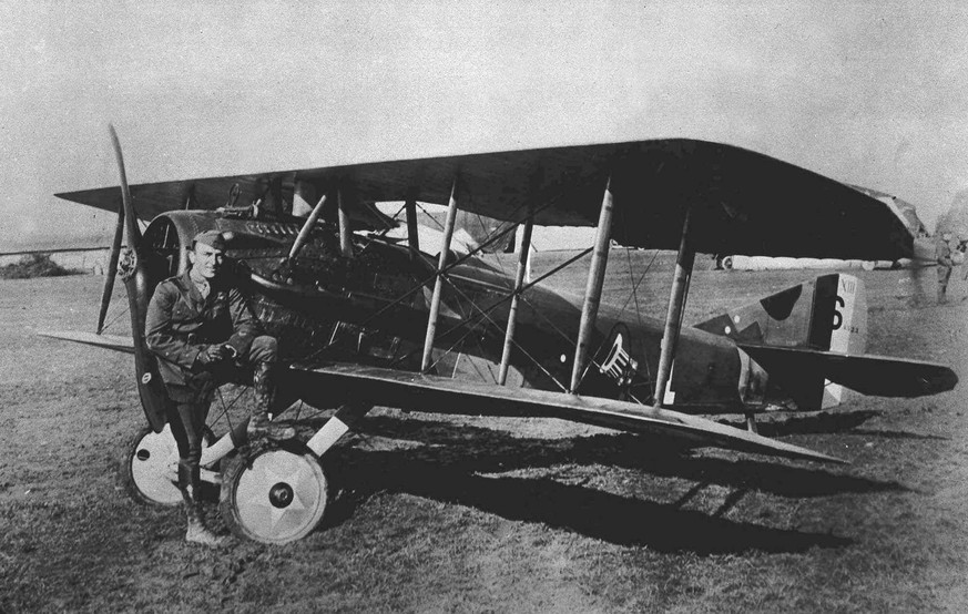 FILE- In this undated file photo, American World War I fighter pilot Eddie Rickenbacker poses with his Spad airplane. Airplanes became weapons in World War I. Airplanes were employed at first for reco ...