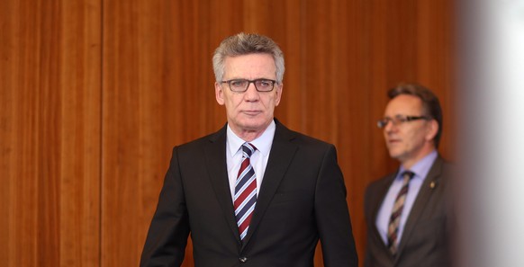 epa05686605 German Interior Minister Thomas de Maiziere arrives for a press conference at the Interior Ministry in Berlin, Germany, 23 December 2016. De Maiziere delivered a statement on the death of  ...