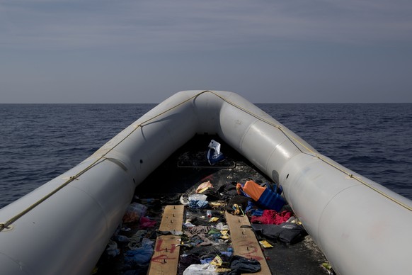 In this April 6, 2017, view of an empty rubber boat after migrants were rescued by members of Proactive Open Arms NGO, in the Mediterranean sea, about 56 miles north of Sabratha, Libya. (AP Photo/Bern ...