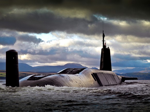 epa05430586 A handout photograph made available by the British Ministry of Defence on 18 July 2016 showing the British Royal Navy submarine HMS Vengeance, the fourth and final Vanguard-class submarine ...