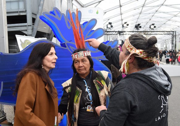 Besucher an der COP 21 in Paris.