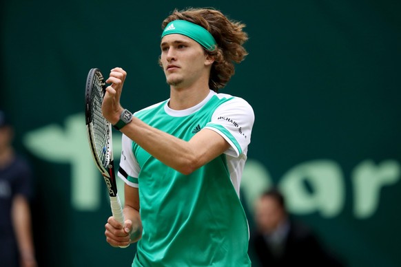 epa06048158 Alexander Zverev of Germany reacts during the semifinal match against Richard Gasquet of France at the ATP tournament in Halle (Westfalen), Germany, 24 June 2017. EPA/TYLER LARKIN