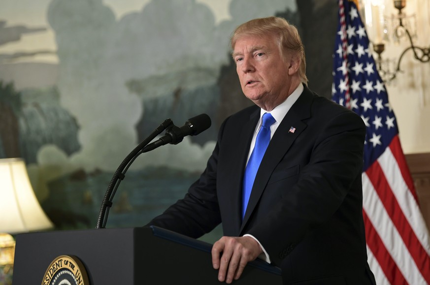 President Donald Trump speaks about Iran from the Diplomatic Reception Room at the White House in Washington, Friday, Oct. 13, 2017. Trump says Iran is not living up to the &quot;spirit&quot; of the n ...