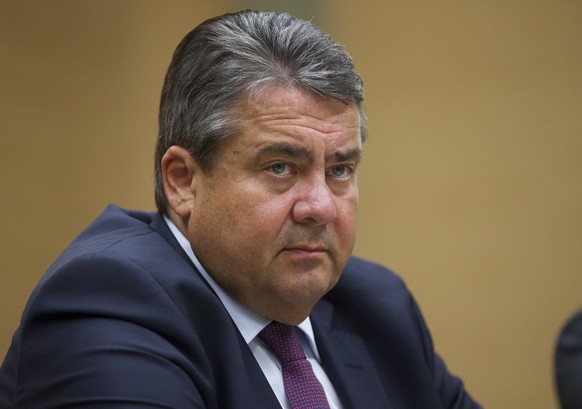 German Vice Chancellor and Economy Minister Sigmar Gabriel listens during his meeting with Russian President Vladimir Putin at the Novo-Ogaryovo residence outside Moscow, Russia, on Wednesday, Sept. 2 ...