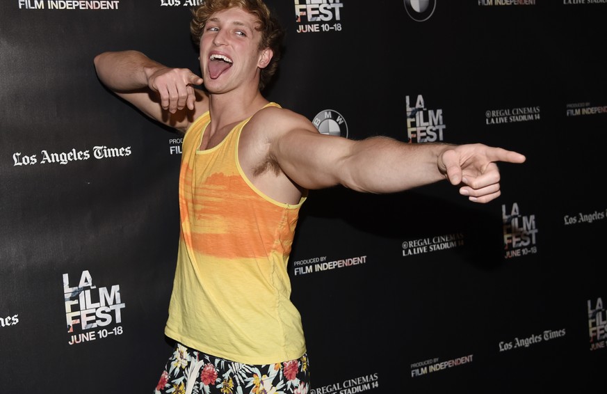 Logan Paul, cast as the character Jeff Spicoli for a live reading of the 1982 film &quot;Fast Times at Ridgemont High,&quot; poses on the closing night of the Los Angeles Film Festival on Thursday, Ju ...