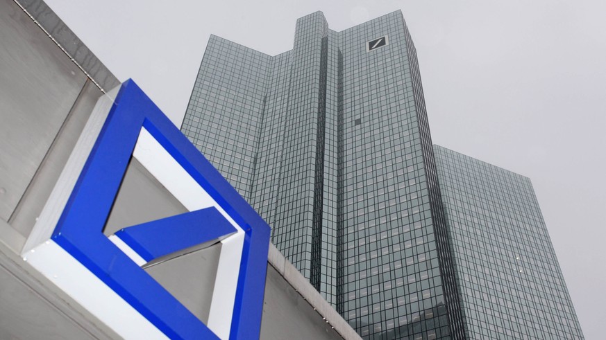 A Deutsche Bank logo is pictured in front of the Deutsche Bank headquarters in Frankfurt in this February 24, 2011 file picture. Deutsche Bank said a decision to seek 8 billion euros ($11 billion) in  ...