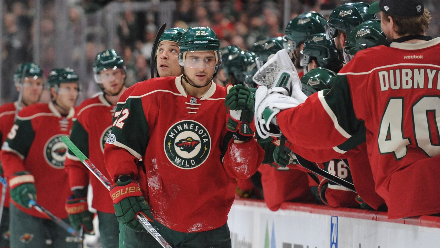 Mar 30, 2017; Saint Paul, MN, USA; Minnesota Wild forward Nino Niederreiter (22) celebrates with teammates on the bench after scoring a goal during the first period against the Ottawa Senators at Xcel ...