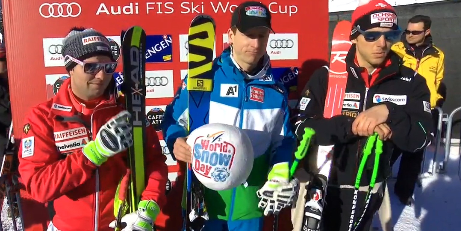 Beat Feuz, Hannes Reichelt und Carlo Janka müssen im Ziel lange warten, bis sie sich final freuen können.