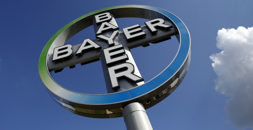 FILE - The Oct. 2, 2013 file photo shows the logo of Bayer at the Berlin Brandenburg Airport in Schoenefeld, Germany. German drug and chemicals firm Bayer says it has increased its offer for U.S. seed ...