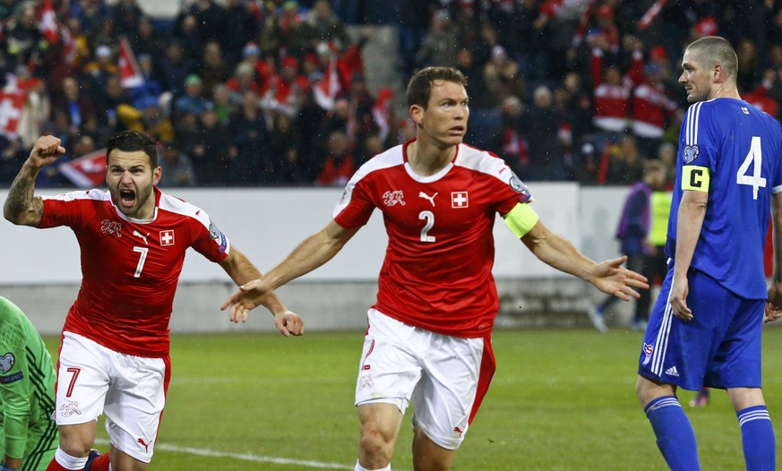 Football Soccer - Switzerland v Faroe Islands - World Cup 2018 Qualifier - Swissporarena, Luzern, Switzerland - 13/11/16 . Switzerland&#039;s Stephan Lichtsteiner and Renato Steffen react REUTERS/Rube ...