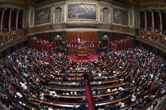 epa06063452 French President Emmanuel Macron (C) speaks during a special congress gathering both houses of parliament (National Assembly and Senate) in the palace of Versailles, outside Paris, France, ...