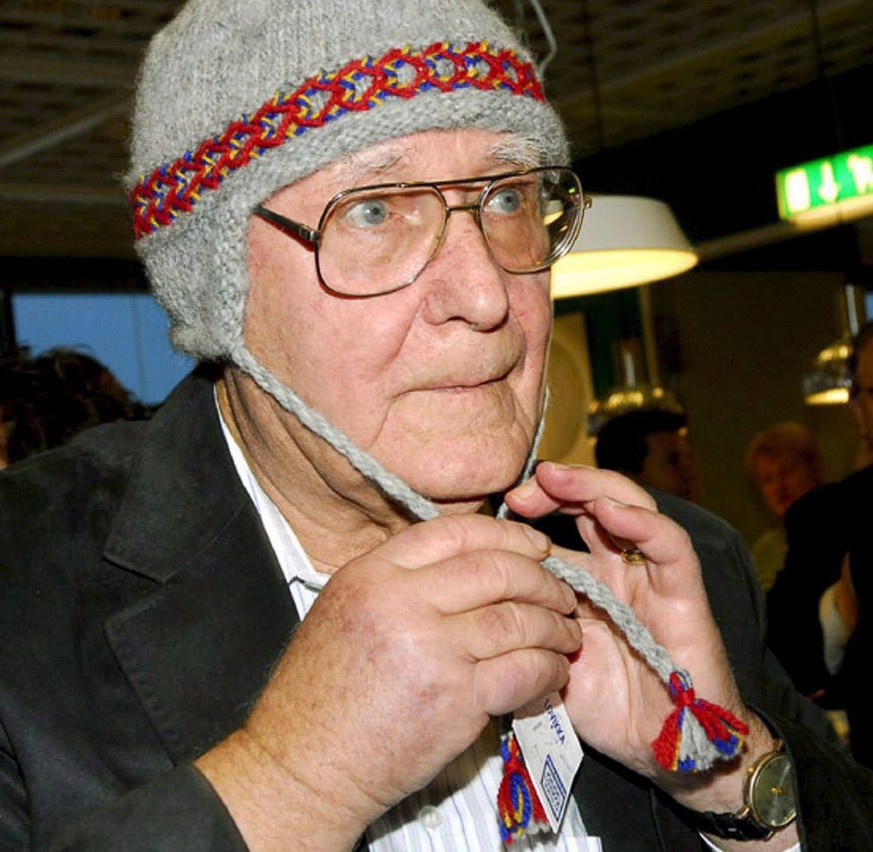 epa03731764 (FILE) A file photo dated 15 November 2006 showing founder and owner of Swedish furniture chain IKEA, Ingvar Kamprad, wearing a traditional arctic cap at the opening of a IKEA branch in Ha ...