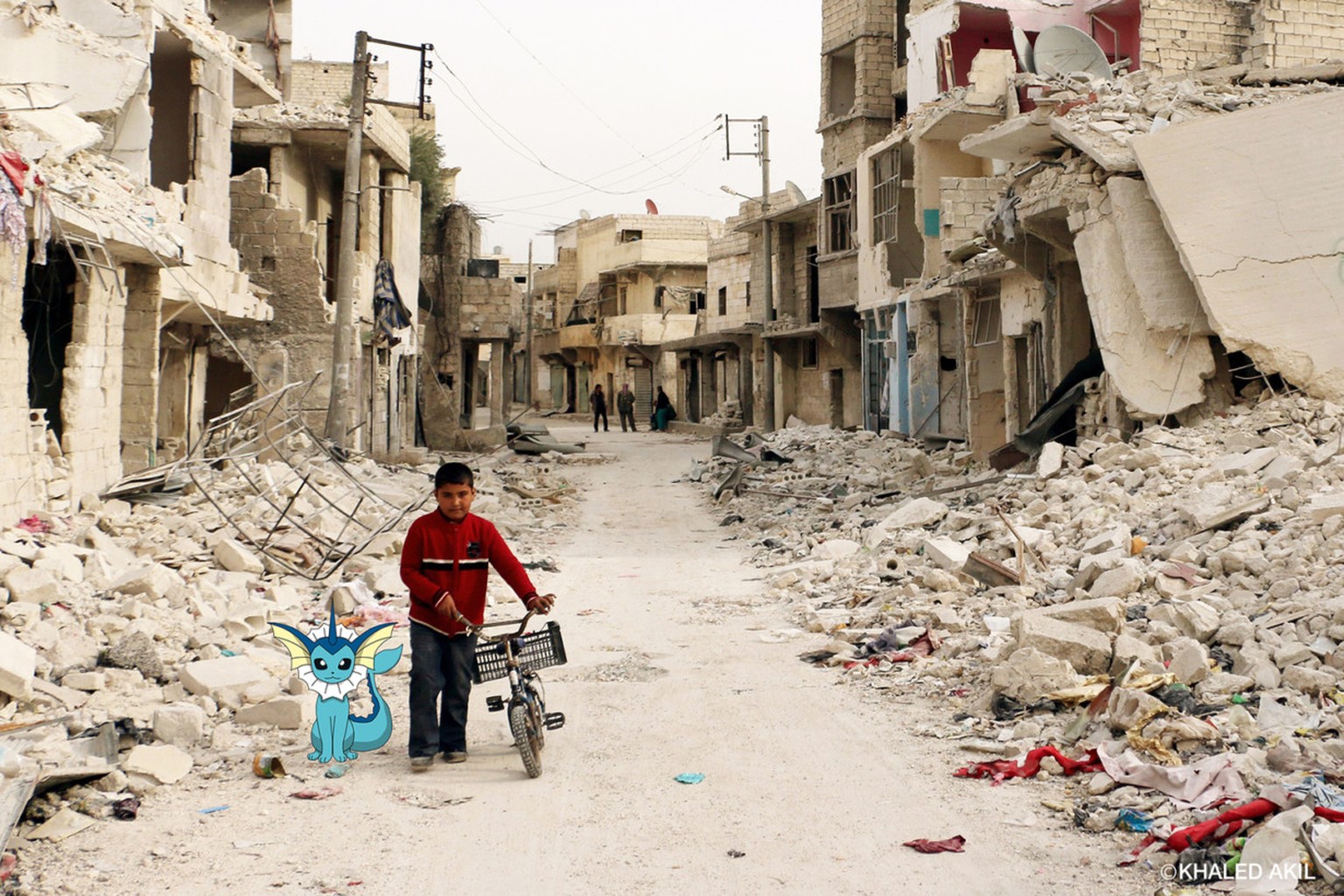 A Syrian boy walks with his bicycle in the devastated Sukari district in the northern city of Aleppo on November 13, 2014, after more than three years of fighting and shelling. Syrians are increasingl ...
