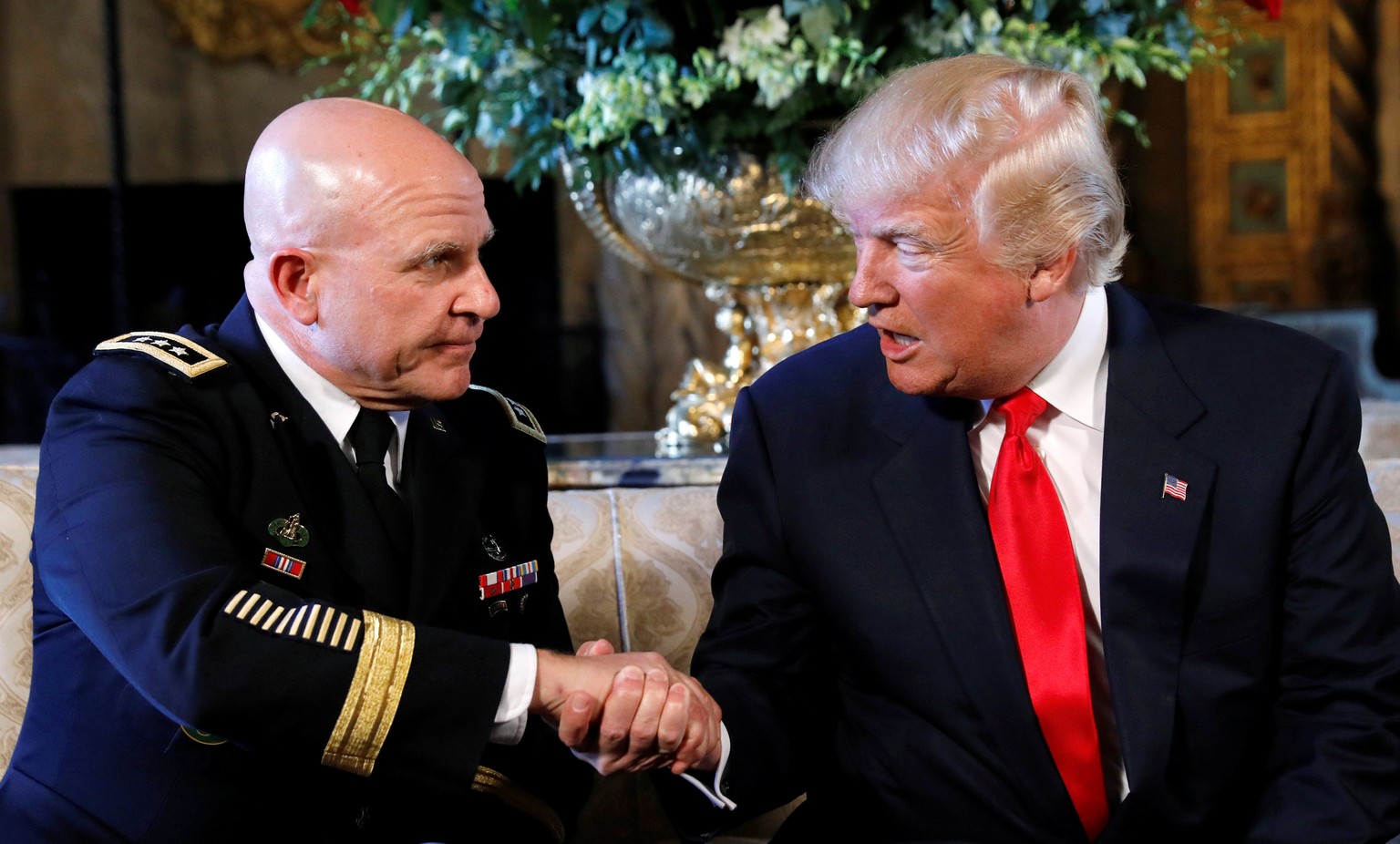 U.S. President Donald Trump shakes hands with his new National Security Adviser Army Lt. Gen. H.R. McMaster after making the announcement at his Mar-a-Lago estate in Palm Beach, Florida U.S. February  ...