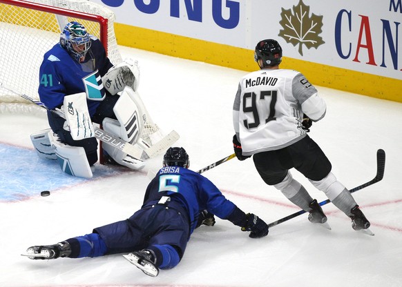 Sep 8, 2016; Quebec City, Quebec, Canada; Team Europe goalie Jaroslav Halak (41) makes a save against Team North America forward Connor McDavid (97) as defenseman Luca Sbisa (5) defends during the thi ...