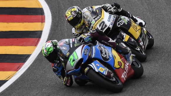 epa06061318 Italian Moto2 rider Franco Morbidelli of EG 0,0 Marc VDS (L) and Swiss Moto2 rider Thomas Luethi of the CarXpert Interwetten team in action during the the Moto2 race of the the motorcyclin ...