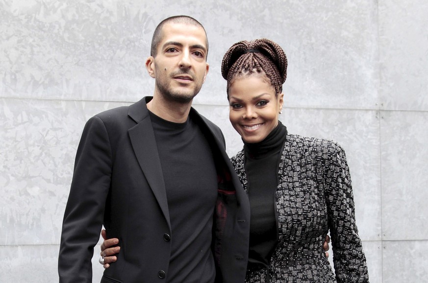U.S. singer Janet Jackson (R) and her then boyfriend Wissam Al Mana pose for photographers as they arrive to attend the Giorgio Armani Autumn/Winter 2013 collection at Milan Fashion Week, February 25, ...