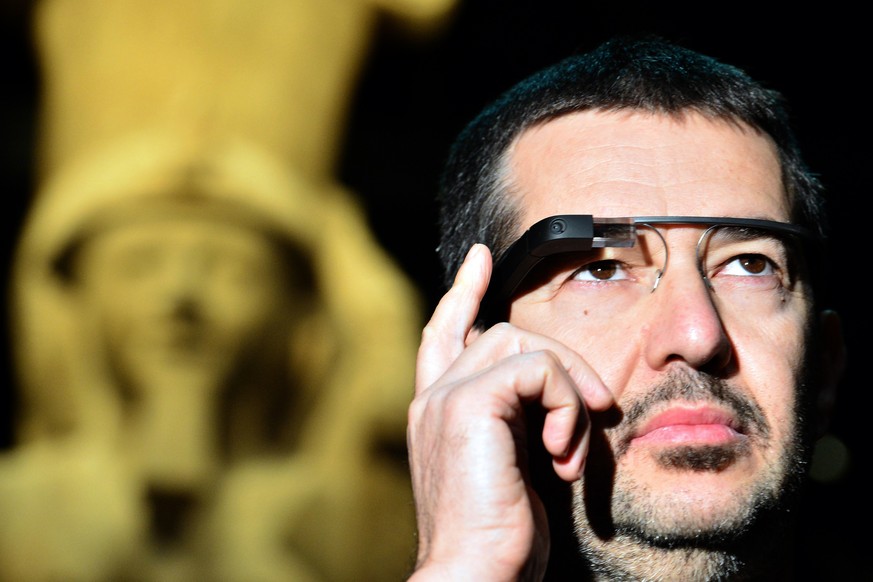 A man tests a pair of Google glasses equiped with LIS (Italian Sign Language - &#039;Linguaggio Italiano dei Segni&#039;) capabilities and created to help deaf people during their visit of the Egyptia ...