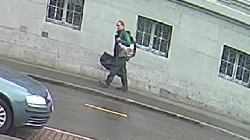 epa06108398 A handout photo made available on 25 July 2017 by the Schaffhausen Police Switerland showing shows the suspect, which was made immediately before the the chainsaw attack in Schaffhausen on ...
