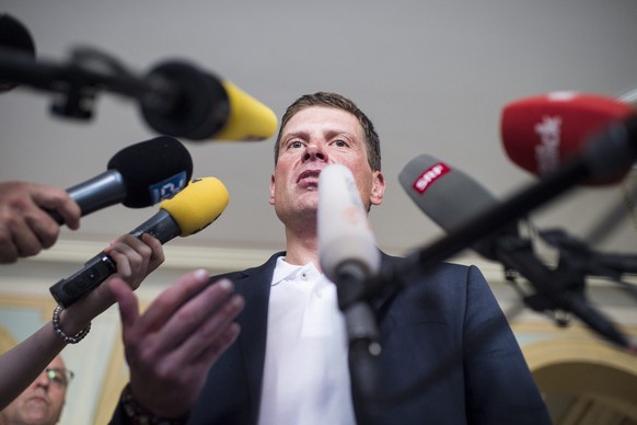 epa04855591 Former German road bicycle racer Jan Ullrich speaks to journalists after his trial at the Rathaus in Weinfelden, Switzerland, 21 July 2015. Jan Ullrich was involved in an accident with thr ...