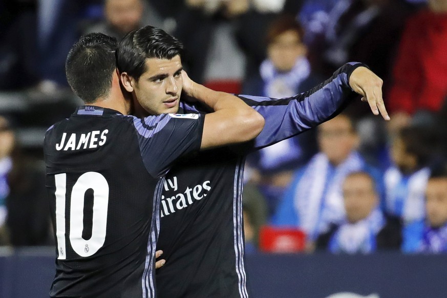 epa05890958 Real Madrid&#039;s striker Alvaro Morata (R) celebrates with his teammate James Rodriguez (L) after scoring a goal during the Spanish Primera Division soccer match between CD Leganes and R ...
