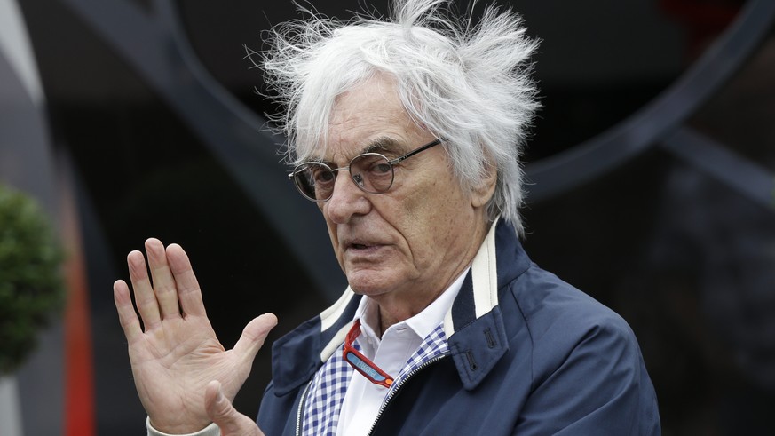 Formula Ones&#039; chief executive Bernie Ecclestone gestures at a paddock after the third free practice at the Silverstone racetrack, Silverstone, England, Saturday, July 9, 2016. The British Formula ...