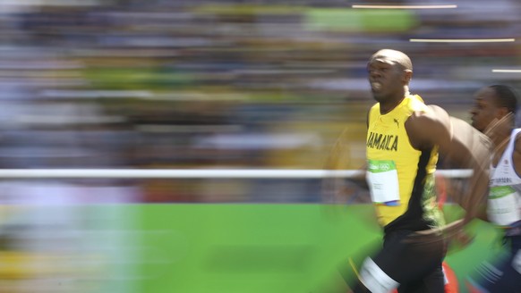 2016 Rio Olympics - Athletics - Preliminary - Men&#039;s 100m Round 1 - Olympic Stadium - Rio de Janeiro, Brazil - 13/08/2016. Usain Bolt (JAM) of Jamaica competes. REUTERS/Kai Pfaffenbach FOR EDITORI ...