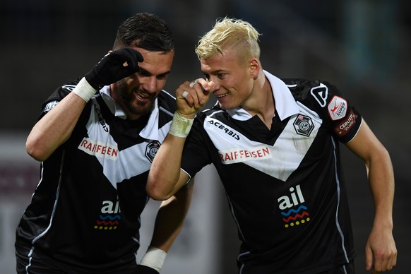 Lugano&#039;s player Ezgian Alioski, right, and Lugano&#039;s player Armando Sadiku, left, celebrate 2-1 goal during the Super League soccer match FC Lugano against FC Lausanne, at the Cornaredo stadi ...