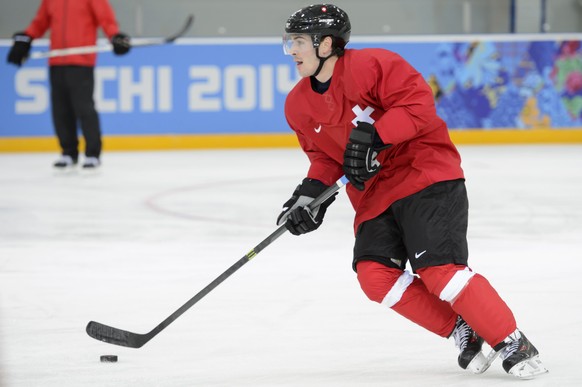 Switzerland&#039;s defender Raphael Diaz plays during a training session of the Swiss men&#039;s national ice hockey team at the XXII Winter Olympics 2014 Sochi in Sochi, Russia, on Monday, February 1 ...