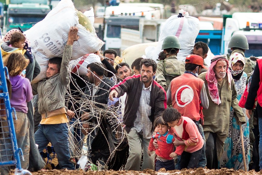 Flucht vor dem IS: Syrische Kurden an der Grenze zur Türkei.