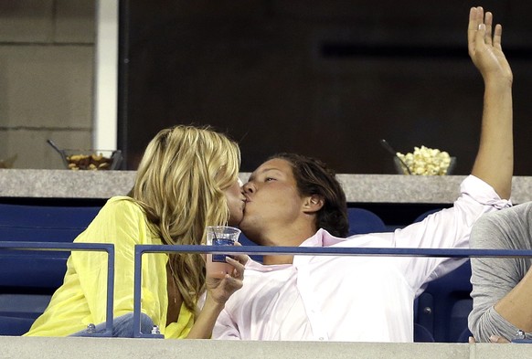 Heidi Klum kisses Vito Schnabel during a match between Victoria Azarenka, of Belarus, and Aleksandra Krunic, of Serbia, during the fourth round of the 2014 U.S. Open Tennis Tournament, Monday, Sept. 1 ...