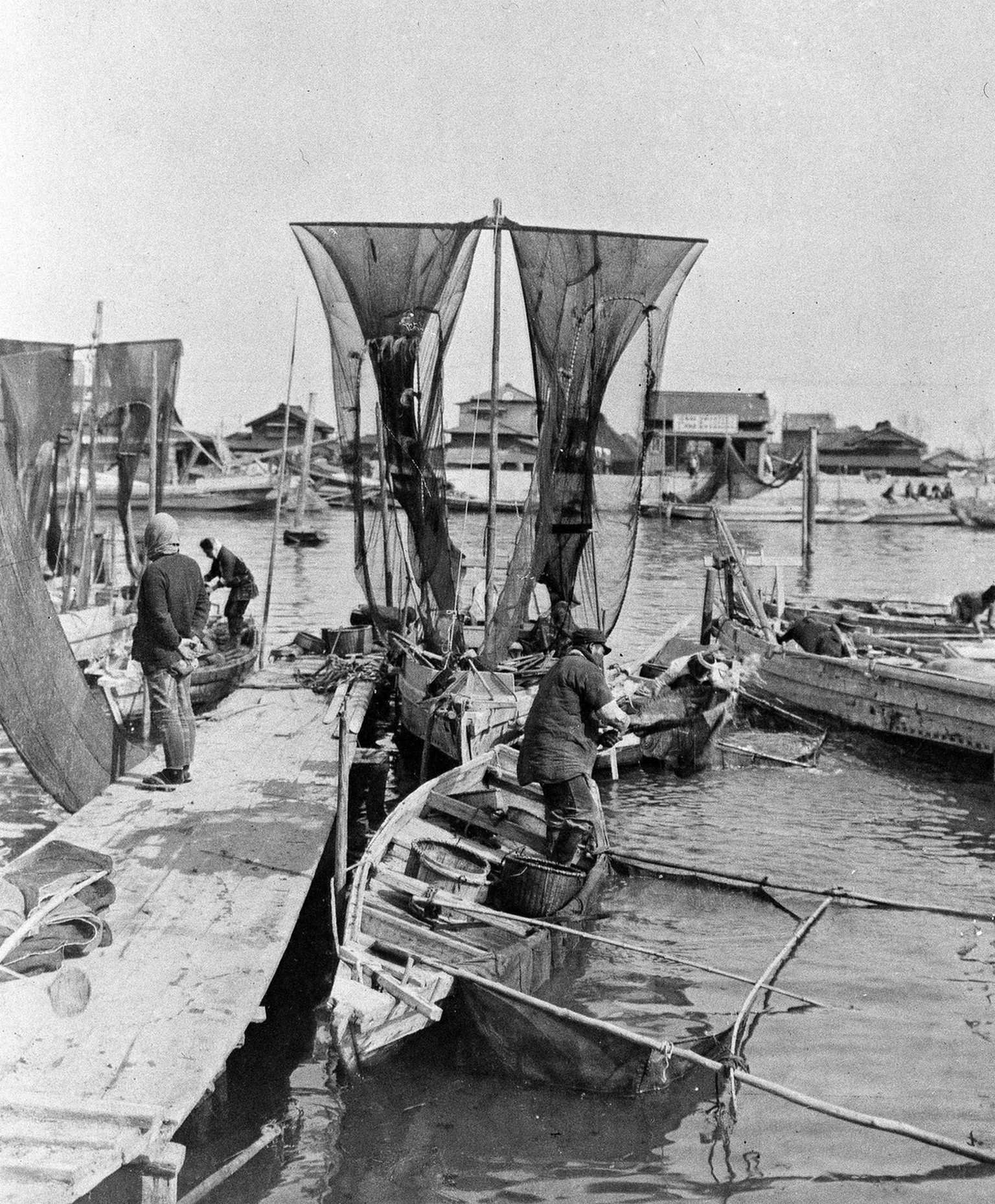 This is the view at the waterfront in Tokyo Bay as fishermen set out for a day&#039;s fishing, 1935. (AP Photo)