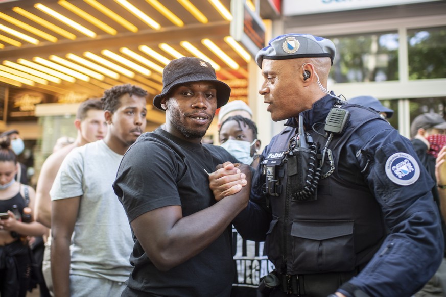 epa08483192 People demonstrate against racism after the worldwide movement of the Black Lives Matter (BLM) protest against the recent death of George Floyd in Zurich, Switzerland, 13 June 2020. Floyd, ...