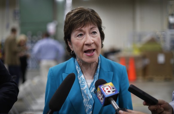 FILE - In this Thursday, Aug. 17, 2017, file photo, U.S. Sen. Susan Collins, R-Maine, speaks to members of the media while attending an event in Lewiston, Maine. Collins said Sunday, Sept. 24, she fin ...