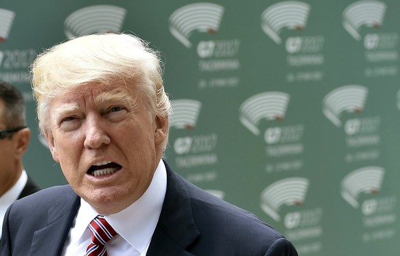 epa05991091 US President Donald J. Trump arrives for the welcome ceremony for the G7 Summit guests in the ancient Theatre of Taormina in the Sicilian citadel of Taormina, Italy, 26 May 2017. Heads of  ...