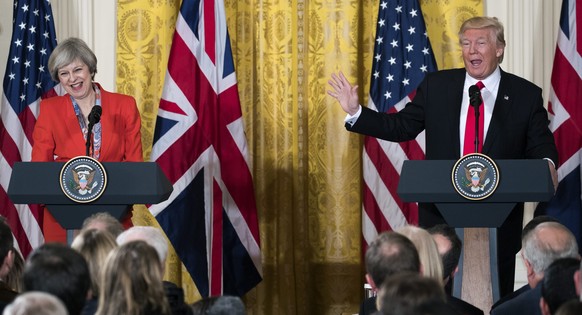 epaselect epa05755212 US President Donald J. Trump and British Prime Minister Theresa May participate in a joint press conference in the East Room of the White House in Washington, DC, USA, 27 January ...