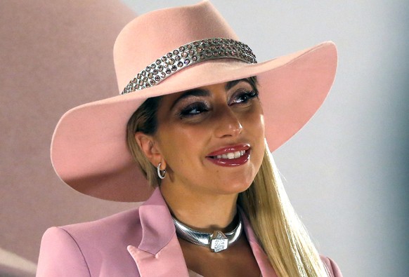 Entertainer Lady Gaga poses for photographers during an event to promote her new album &#039;Joanne&#039; in Tokyo, Wednesday, Nov. 2, 2016. (AP Photo/Shuji Kajiyama)