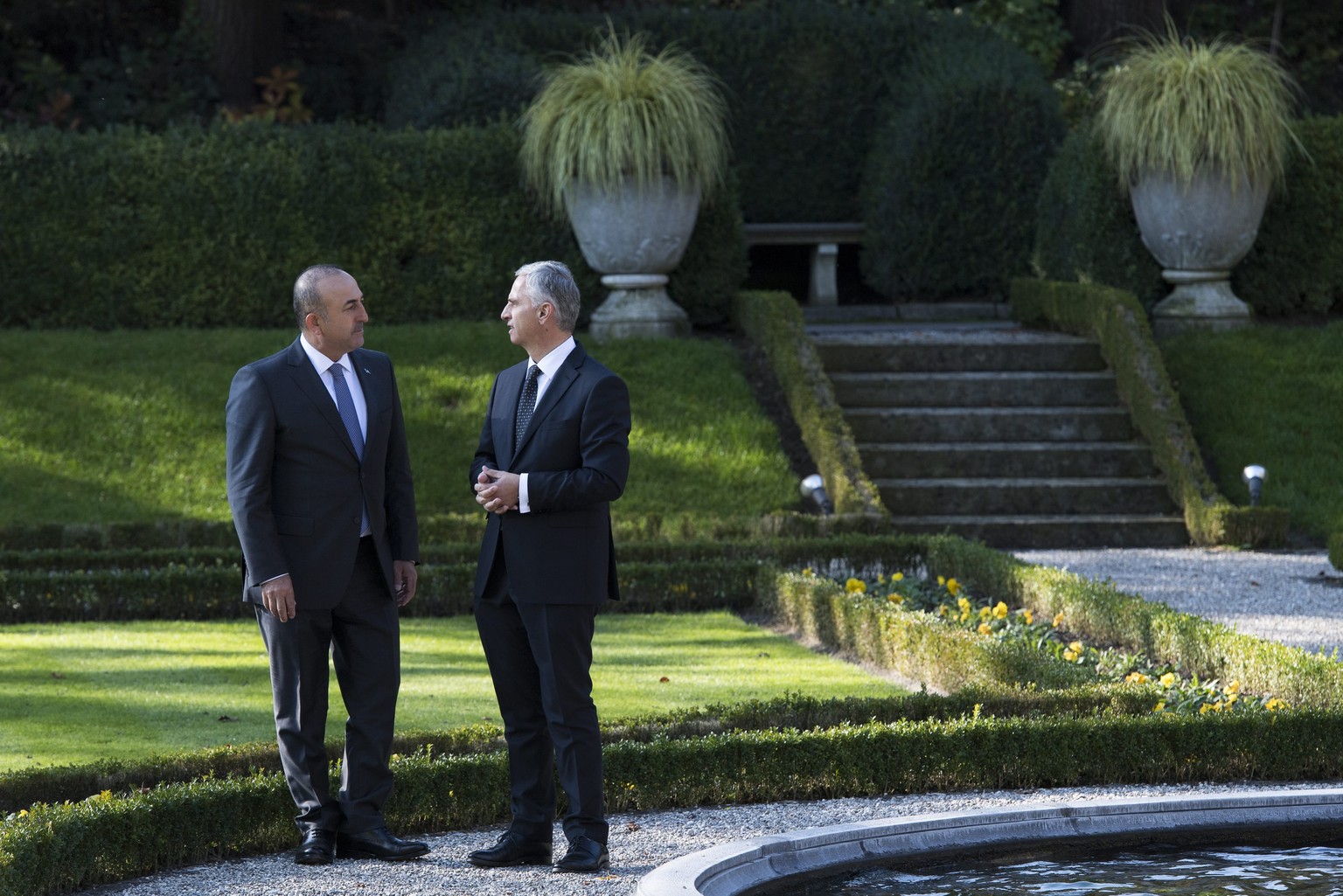 epa05615491 Mevlut Cavusoglu, Minister of Foreign Affairs of the Republic of Turkey, (L), and Swiss Federal Councillor and minister of Foreign Affairs Didier Burkhalter, (R), speak together at the Loh ...