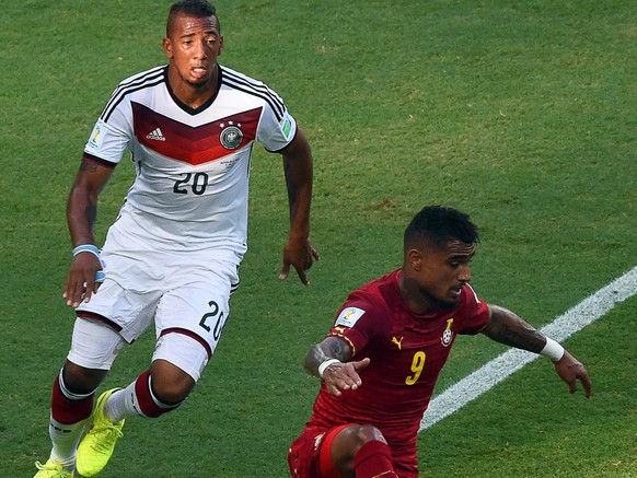 epa04271535 Kevin Prince Boateng (R) of Ghana in action against his brother Jerome Boateng (L) of Germany during the FIFA World Cup 2014 group G preliminary round match between Germany and Ghana at th ...