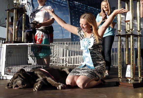 epa06046767 Pet owner Shirley Zindler of Sebastopol California celebrates after her dog Martha is named the winner of the 2017 World&#039;s Ugliest Dog Contest in Petaluma, California, USA, 23 June 20 ...