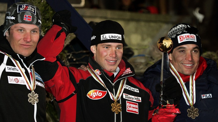 From left, Norway&#039;s Aksel Lund Svindal, silver, Benjamin Raich of Austria, gold, and bronze medallist Giorgio Rocca of Italy take part to the medal ceremony for the Men&#039;s Combined at the Wor ...