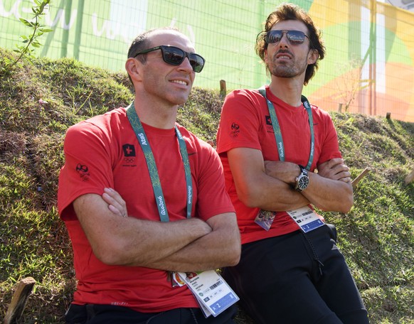 Fabian Cancellara, right, and Michael Albasini, left, cyclists of Switzerland, during the welcome ceremony of the Team Switzerland in the Olympic Media Village in Rio de Janeiro, Brazil, prior to the  ...