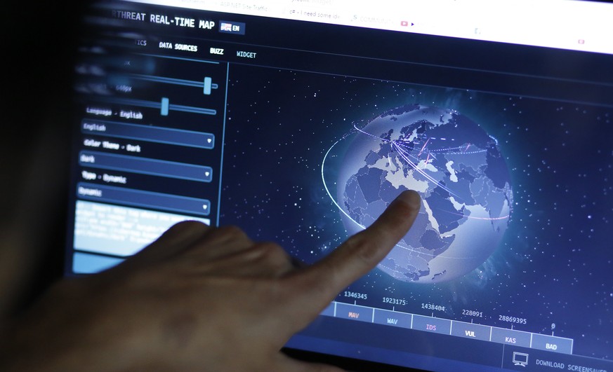 epa06053017 An engineer checks live cyber threat maps and statistics at his office in Istanbul, Turkey, 27 June 2017. According to news reports, companies around the world on 27 June 2017 are reportin ...