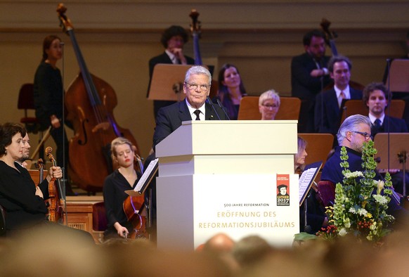 epa05611683 German President Joachim Gauck speaking during the ceremonial act for the opening of the reformation jubilee &#039;500 Years of Reformation&#039; at the Konzerthaus concert house in Berlin ...