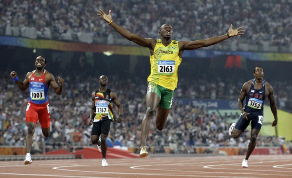 FILE - In this Aug. 20, 2008 file photo, Jamaica&#039;s Usain Bolt crosses the finish line to win the gold in the men&#039;s 200-meter final during the athletics competitions in the National Stadium a ...