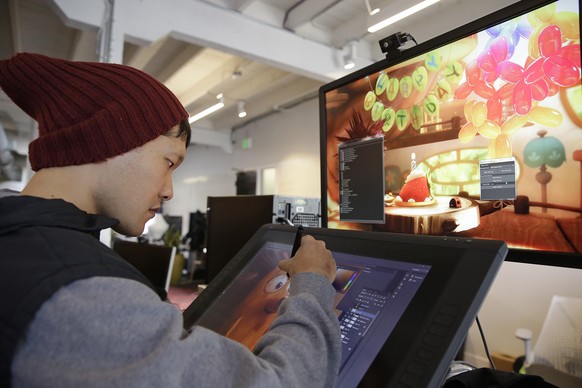 In this photo taken Tuesday, Nov. 17, 2015, an art director works on visual development at the Oculus Story Studio, a hub for digital animators and experimental filmmakers in San Franciscos trendy So ...