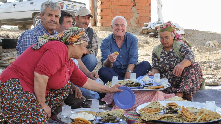 Picture Shows: Rick Stein enjoys a Turkish picnic with a family of goat farmers in the village of Gölcük, Western Turkey.